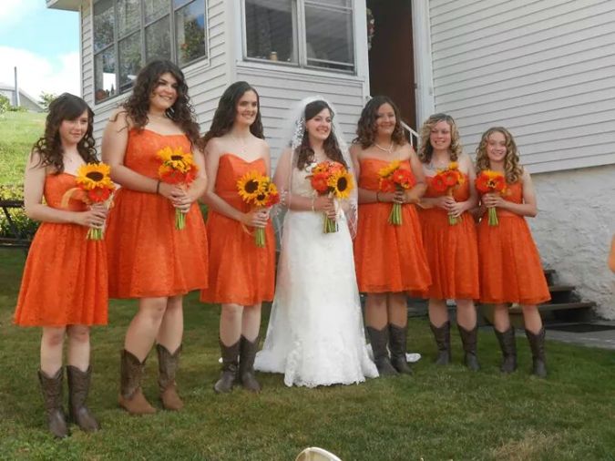 Bridesmaids and the Bride. I LOVED our orange lace dresses and cowboy boots- I was so comfortable AND fashionable!